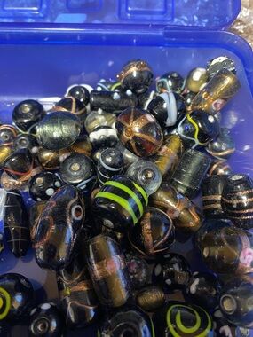 Lamp work black glass bead bag